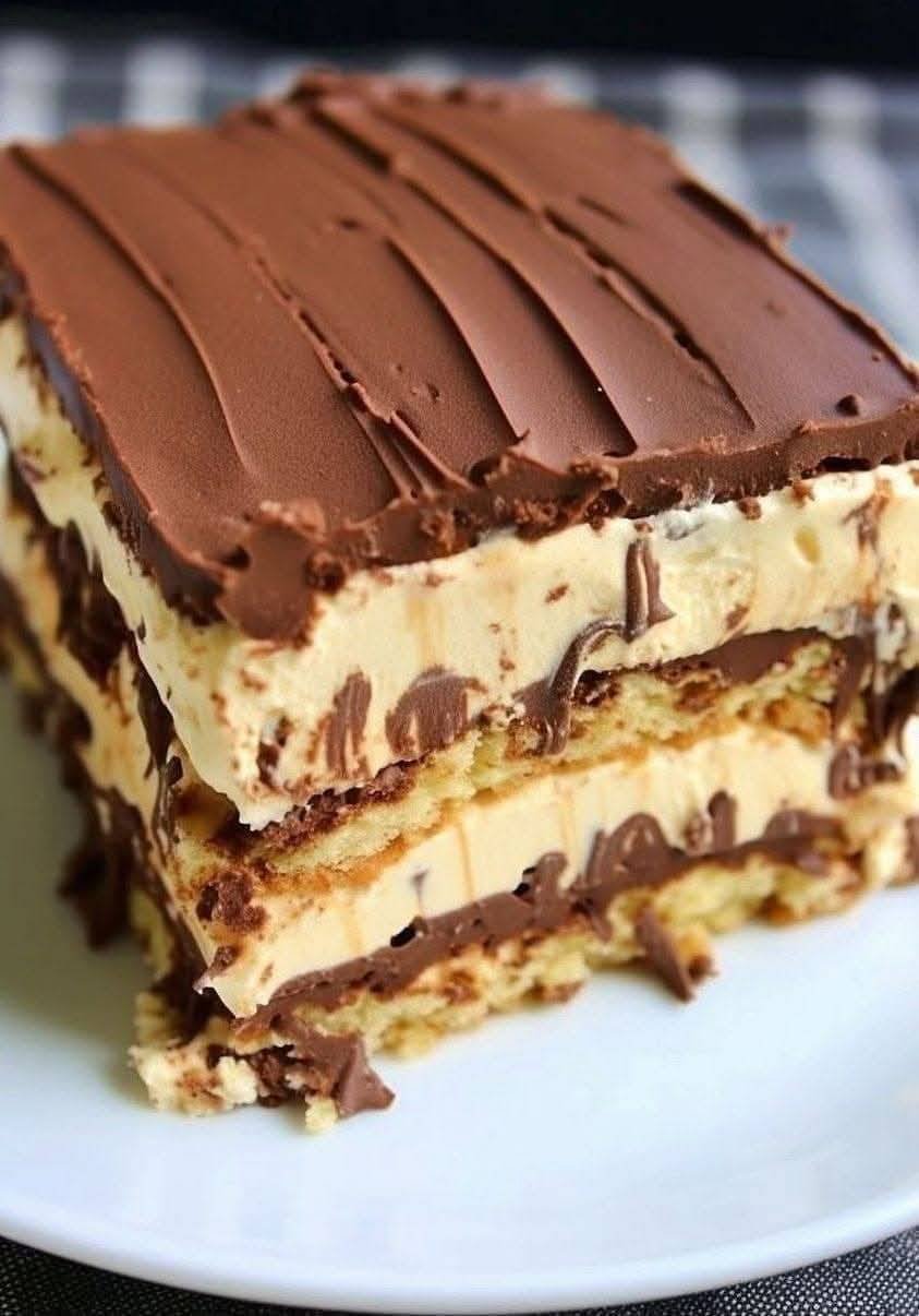 No-Bake Chocolate Eclair Cake 480881095_2100699330376908_4673004729960973922_n